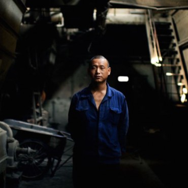 A factory worker in Beijing. Raphael Olivier / Flickr