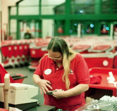 A cashier at Target. shazbot music / Flickr