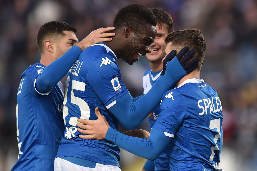  The image shows a group of football players celebrating a goal, the image is related to the search query 'John Foot book Calcio about Italian football and Gareth Southgate'.